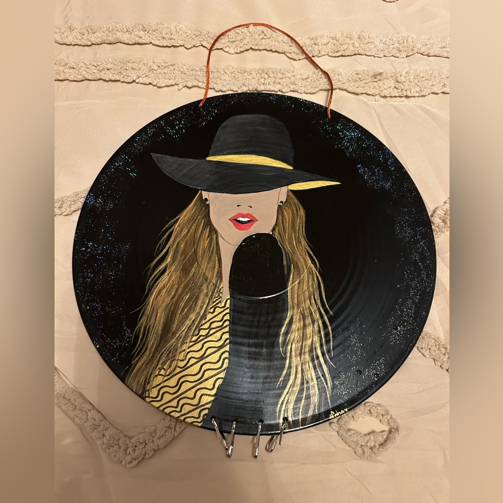 Handcrafted vinyl jewelry holder